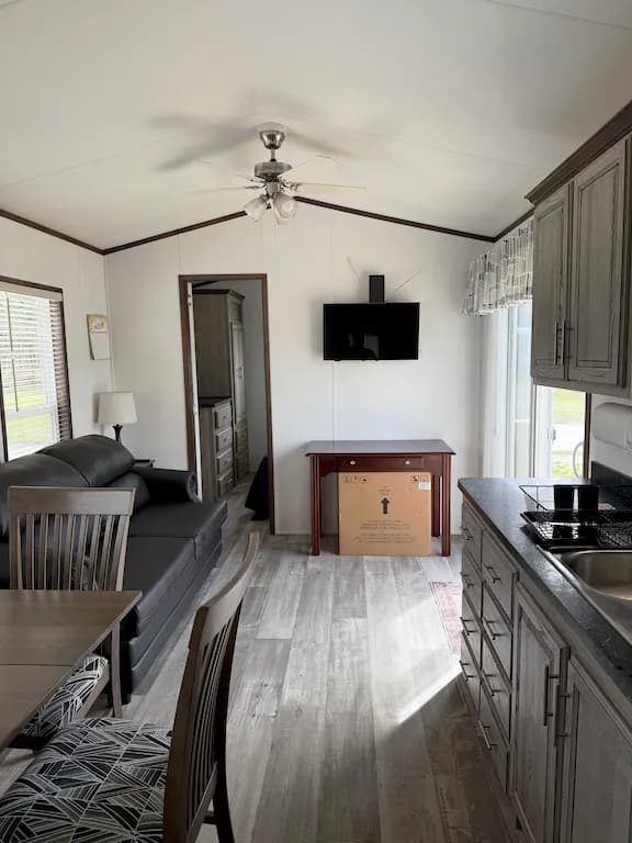 Park model cabin interior with full kitchen and living area