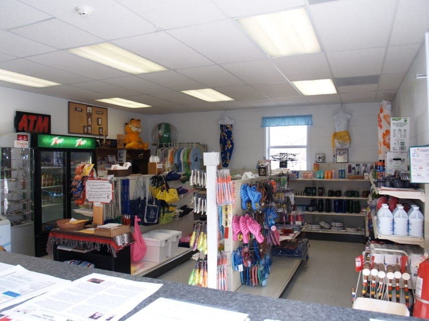 Resort store interior with merchandise, souvenirs, and sundries on display