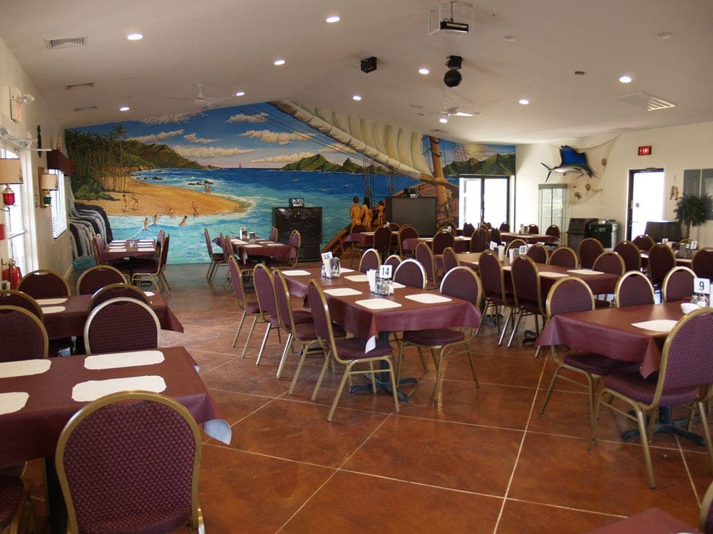 Interior of The Tradewinds Restaurant with cozy seating